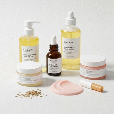 Close-up of various skincare products and ingredients on a clean, bright surface, representing a balanced skincare routine