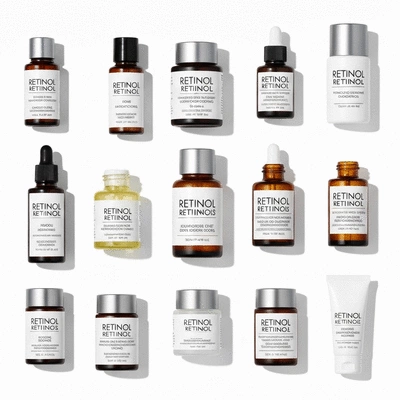 Assortment of retinol skincare products with different concentrations on a clean, white background