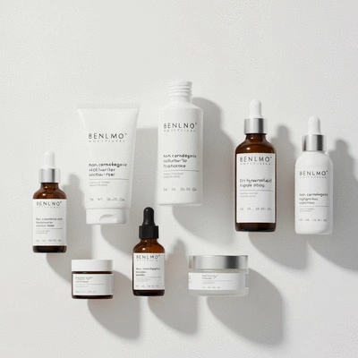 A collection of skincare products specifically designed for dry acne-prone skin, including non-comedogenic moisturizers, serums with hyaluronic acid, and gentle cleansers, arranged neatly on a clean, minimalist background, no text, no words, no typography, no labels, clean image